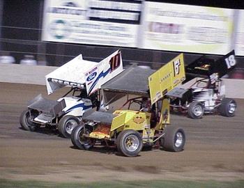 Adam Jones (15h) and Steve Beach (10) battle in front of Tony Bruce, Jr.