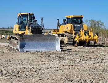 JD 1050 dozer for stripping dirt and JD 850 for finish reclamation work.