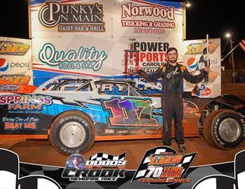 Justin Fite claims the checkered flag after his win at Lancaster Motor Speedway on May 3rd during the Buddy Crook Memorial.