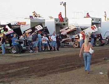 Milling about the Tulsa Speedway pit area