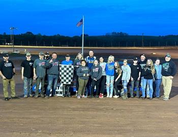 Todd Brennan and his entire crew pose in Victory Lane after his win at Midway Speedway on May 4.