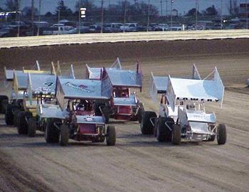 The first heat race in ASCS Midwest Region history paces down the backstretch.