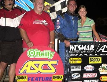 Darren Stewart in victory lane at Creek County Speedway