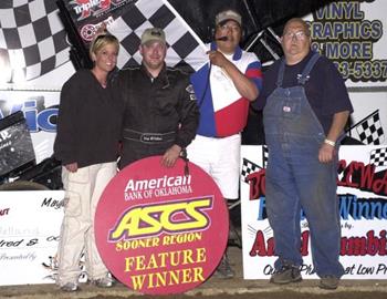 Brian McClelland and company in victory lane