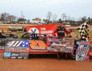 Cory Hedgecock in Victory Lane at 411 Motor Speedway on November 26, 2022. (Chad Wells image)