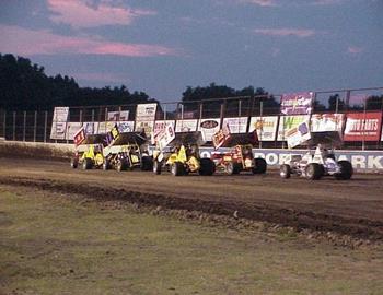 Heat race lines up down the backstretch