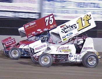 Garry Lee Maier (11x) and Jesse Hockett (75) in heat race action