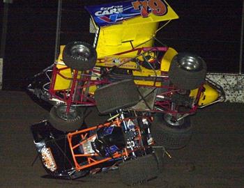 Charlie McDonald (79) lands on top of Koby Barksdale