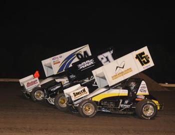 Nick Smith (15s), Bud Johnson (27w) and Danny Wood (94) lead the three-wide salute