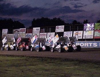 Heat race lines up down the back stretch