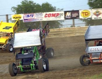 Gavin Punch (81) leads the three-wide trio of S. McClelland (1), Walker (2) and Davis (72)