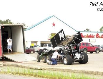 Brandon Corn and crew pull maintenance in a grocery store parking lot in Cleveland, TX