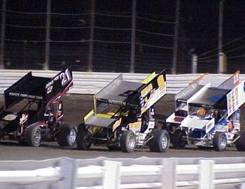 Gary Wright (9) and Brian Brown (21) lead the feature field