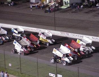 Three-wide at the famed Devils Bowl Speedway