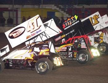 Jason Johnson (41), Daryn Pittman (21) and Garry Lee Maier lead the three-wide salute