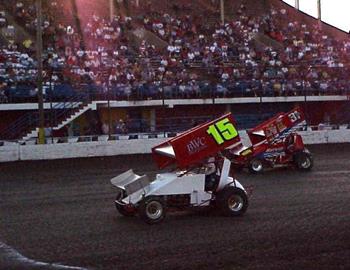 Sam Hafertepe, Jr. (15) and Brian Harvill race down the frontstretch