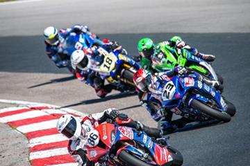 YOUNG TAKES A POLE POSITION, A 1ST, A 2ND AND A 3RD IN TRIPL