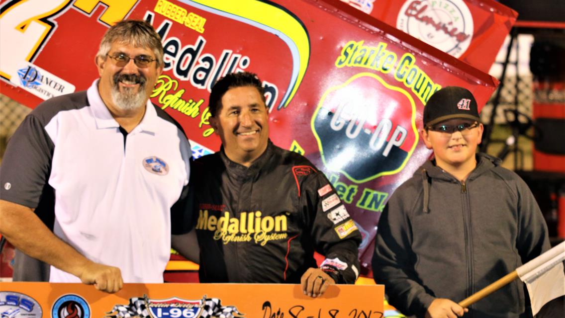 HANNAGAN SETS TRACK RECORD AND WINS FEATURE