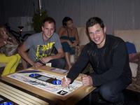 Nick Lachey with Justin signing the Tayble for Charity after finishing his 98 Degrees 10 year reunion set