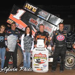 Thursday night&amp;#39;s Lucas Oil ASCS presented by K&amp;amp;N Filters National winner Sammy Swindell is joined by runner-up Johnny Herrera (left) and third-place Donny Schatz (right) after topping the opening night of the 44th Annual Kronik Energy Drink Western Wold Championships at Tucson&amp;#39;s USA Raceway. (Tim Aylwin photo)