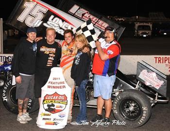 Sam and The Plumbfast Racing Team in victory lane after Sam won The Spring Nationals at Devils Bowl Speedway Tim Aylwin/Eagle Eye photo Tim Aylwin/Eagle Eye photo