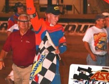 Jeff VanDusen celebrates his first ASCS win