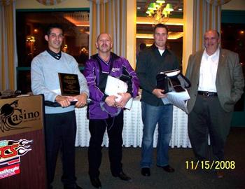 Top Three in Hard Charger standings - Brandon Berryman, Gary Watson and Michael McNeil with Joe Gabbarb of Tango Transport