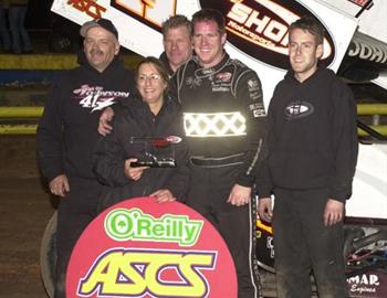 Jason Johnson and crew in victory lane