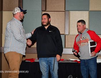 Michael Tyre (left) is greeted by OCRS co-owners Terry Mattox (center) and Kerry Gorby. Danny Clum photo.