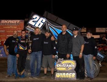 Sam and The Rudeen Racing Team in victory lane
